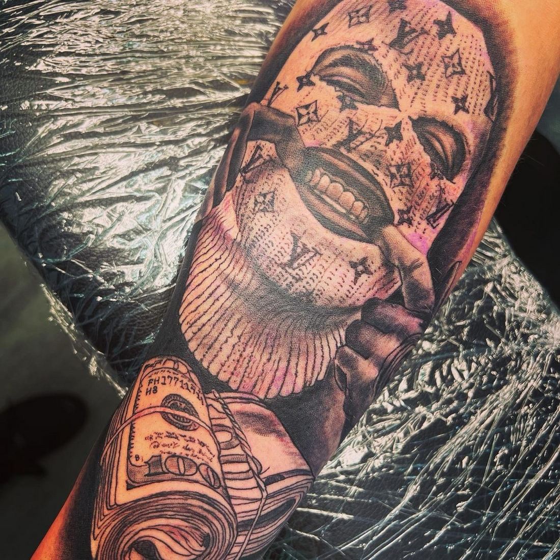 Tattoo: Black & grey — Masked portrait