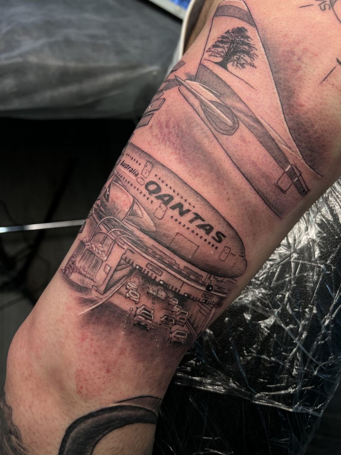 Tattoo: Black & grey — Qantas aircraft