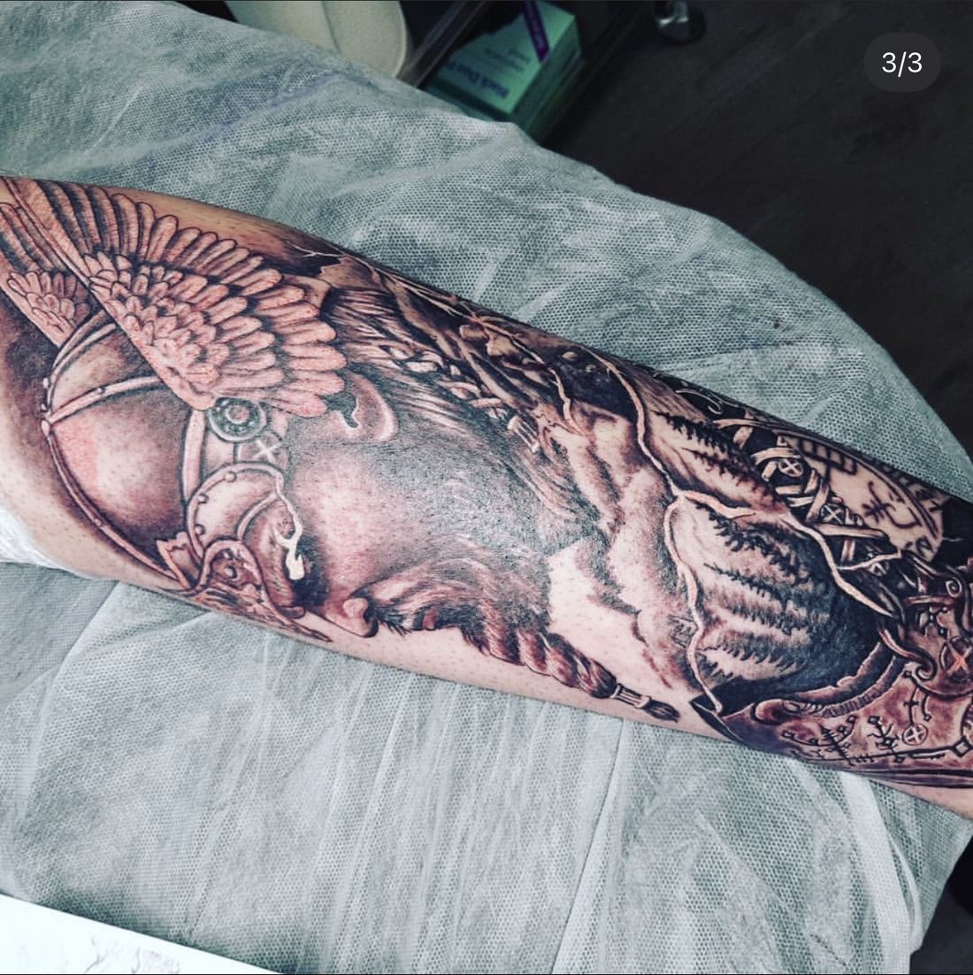 Tattoo: Black & grey realism — Viking and wolf